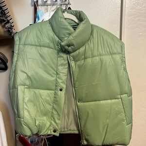 Green puffer vest with attachable sleeves